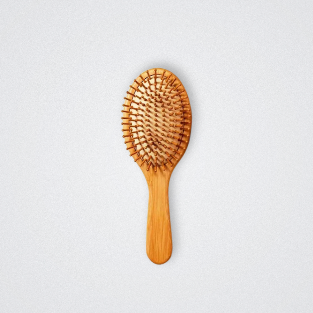 Mini bamboo hairbrush for travel plastic free eco friendly sustainable detangling